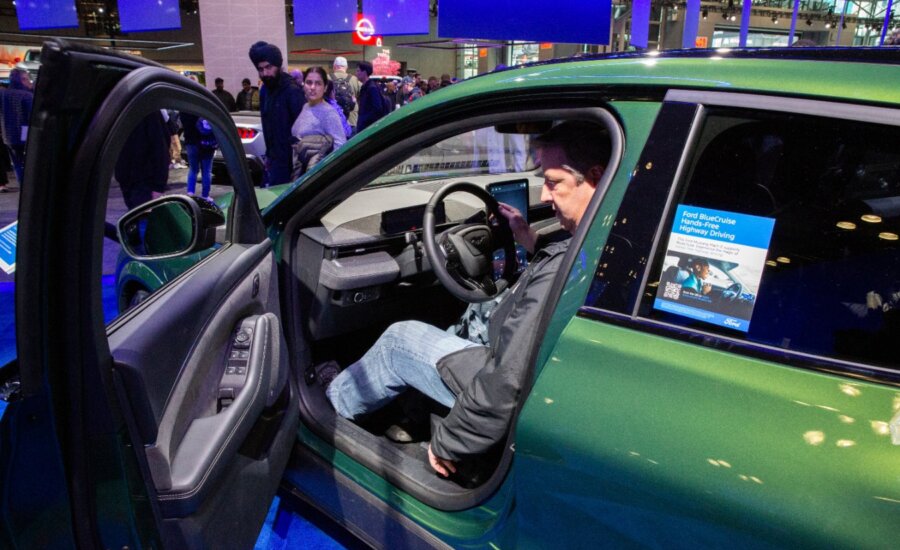 Automakers are pivoting to novel software releases for monthly, yearly or multi-year-long in-car subscriptions. A Ford Mustang Mach-E electric vehicle with Ford BlueCruise Hands-Free Highway Driving is at the New York International Auto Show in New York on Saturday, March 30, 2024.