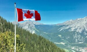 A Canada flag waving at Banff National Park in Alberta