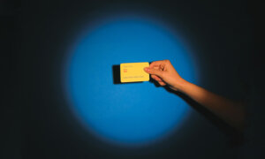 A Canadian credit card in a spotlight.