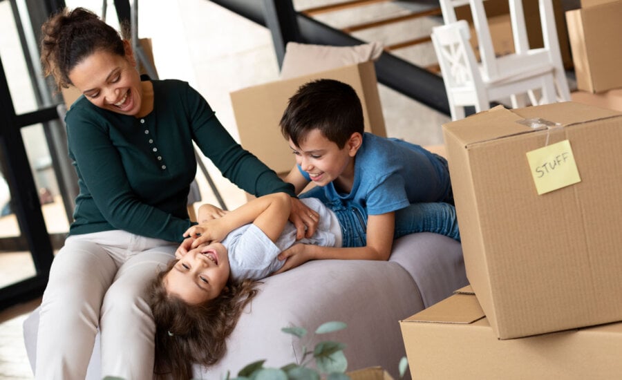 A Canadian family moving, thanks the BoC rate cuts, which improved mortgage affordability in Vancouver, Toronto and Hamilton