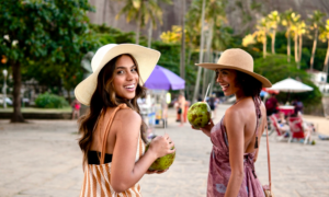Two young women on vacation in a tropical country